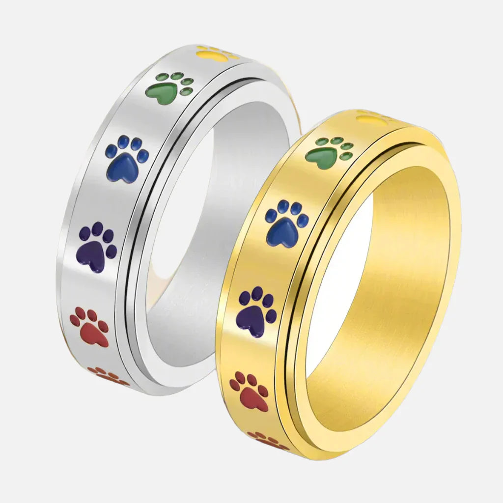 Bague Anti-Stress Rotative en Or et Argent avec Motifs de Pattes Colorées – Thea