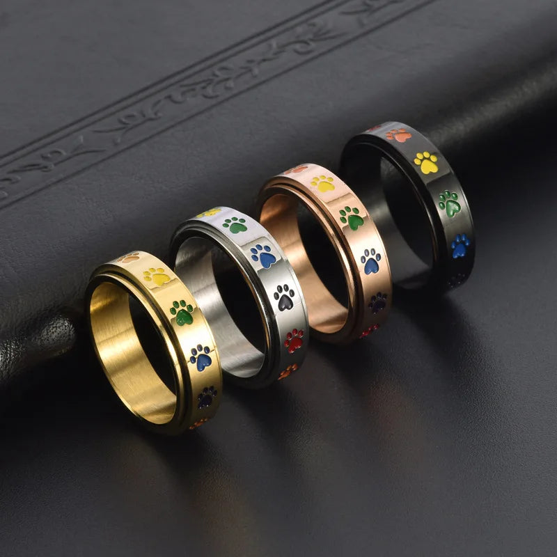 Bague Anti-Stress Rotative en Or et Argent avec Motifs de Pattes Colorées – Thea