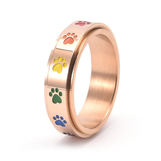 Bague Anti-Stress Rotative en Or et Argent avec Motifs de Pattes Colorées – Thea